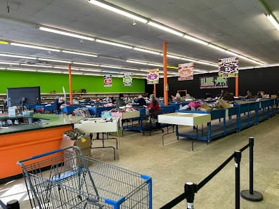 Inside Local Line Bargain Bins & Discount Warehouse - bin store floor view